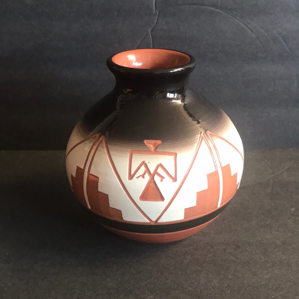 New Tribal pottery vase with four symbols signed